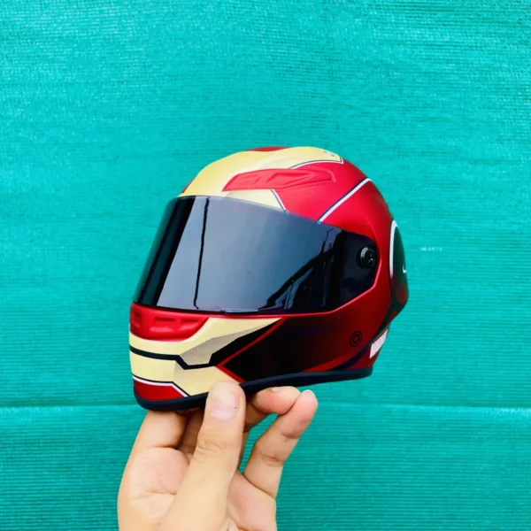 Second image of HJC Limited Edition White Venom Villain Miniature helmet and Iron Man helmet